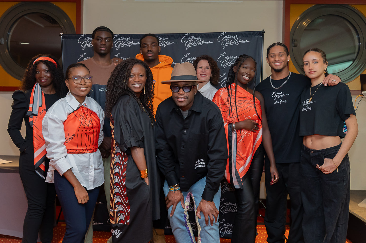 Empower Global Women 2025 ~ Featuring the Exclusive Aizo Paris Signature T-Shirt